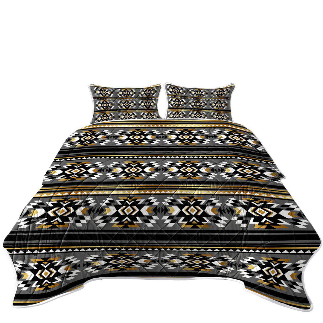 King Size Quilt with Golden Aztec Pattern over Grey