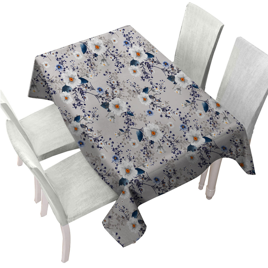 Tablecloth with White and Blue Flowers over Grey