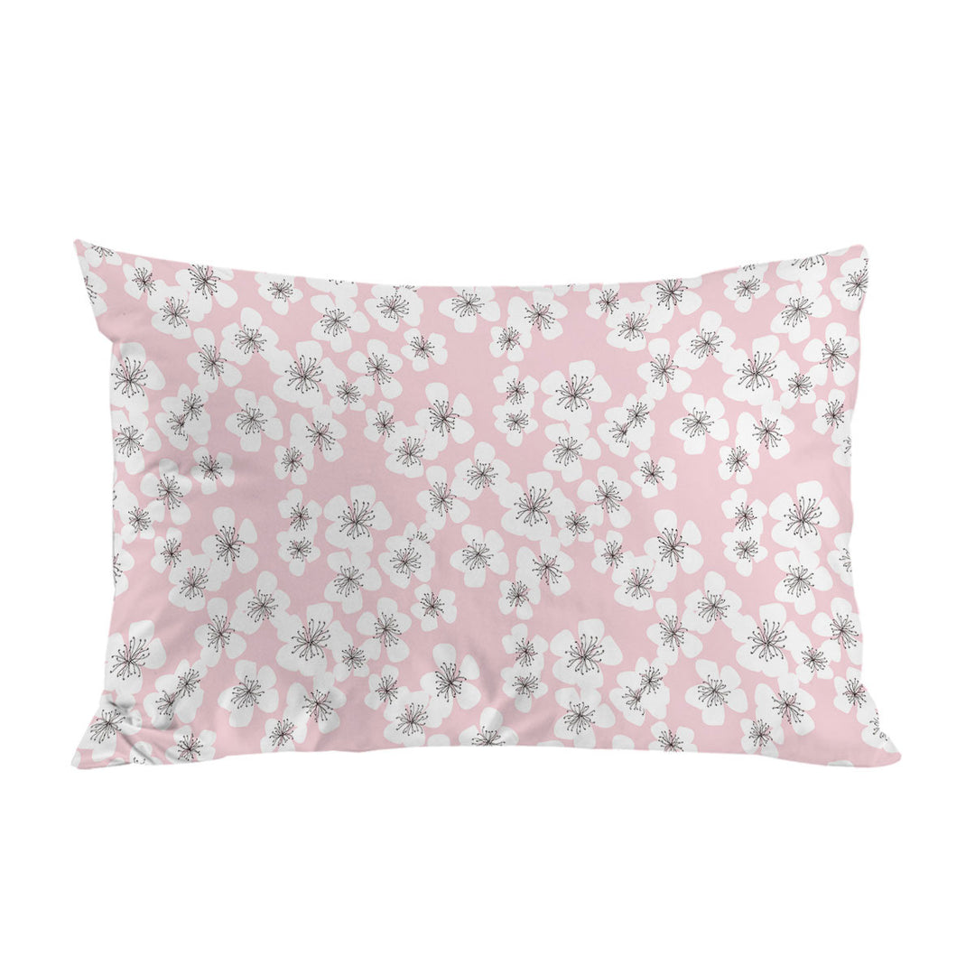 White Floral Drawings over Pink Pillowcase